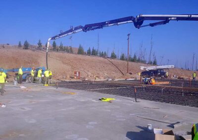 Crew on slab placement with pump truck