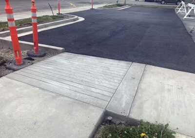 New access ramp with curb and gutter